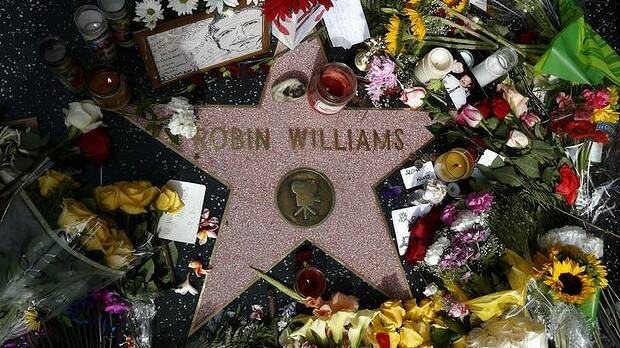 A floral tribute at the Hollywood star of Robin Williams. Picture: REUTERS