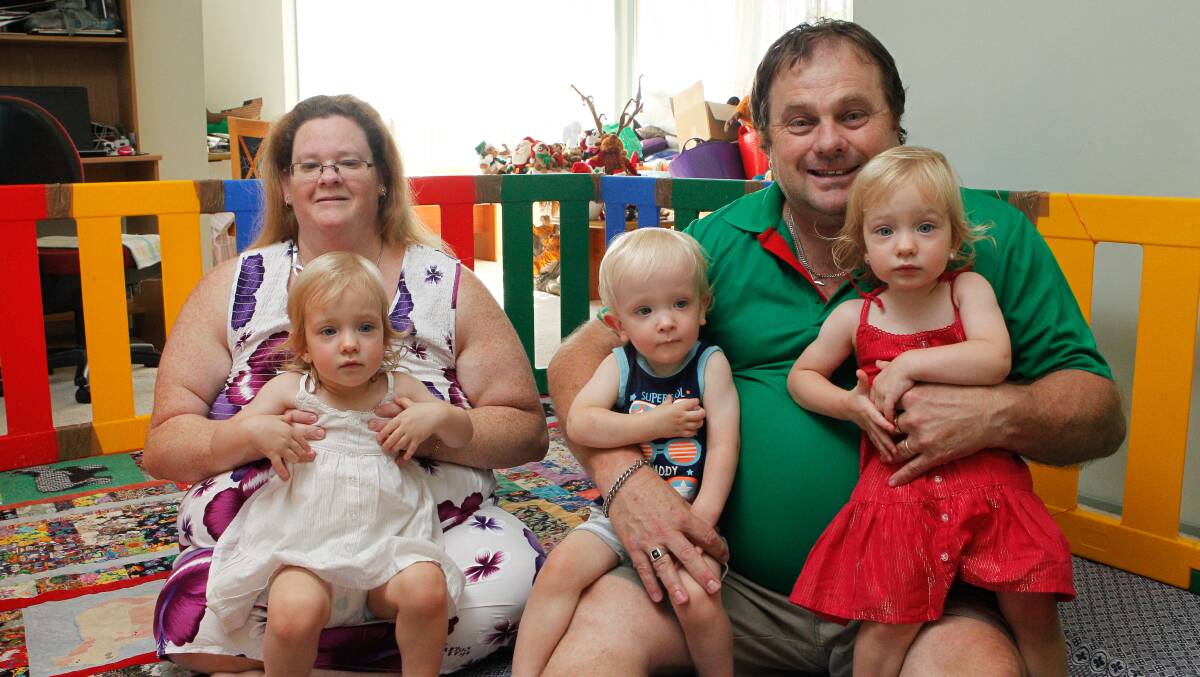 Sharon and Stephen Smith are celebrating Multiple Birth Awareness Week with 22-month-old triplets Sapphire, Brianna and Cooper. Picture: CHRISTOPHER CHAN