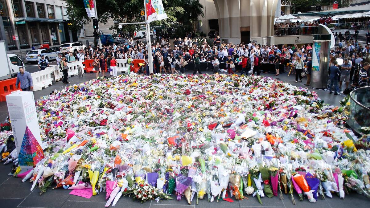 Flowers are left at Martin Place. Picture: GETTY IMAGES