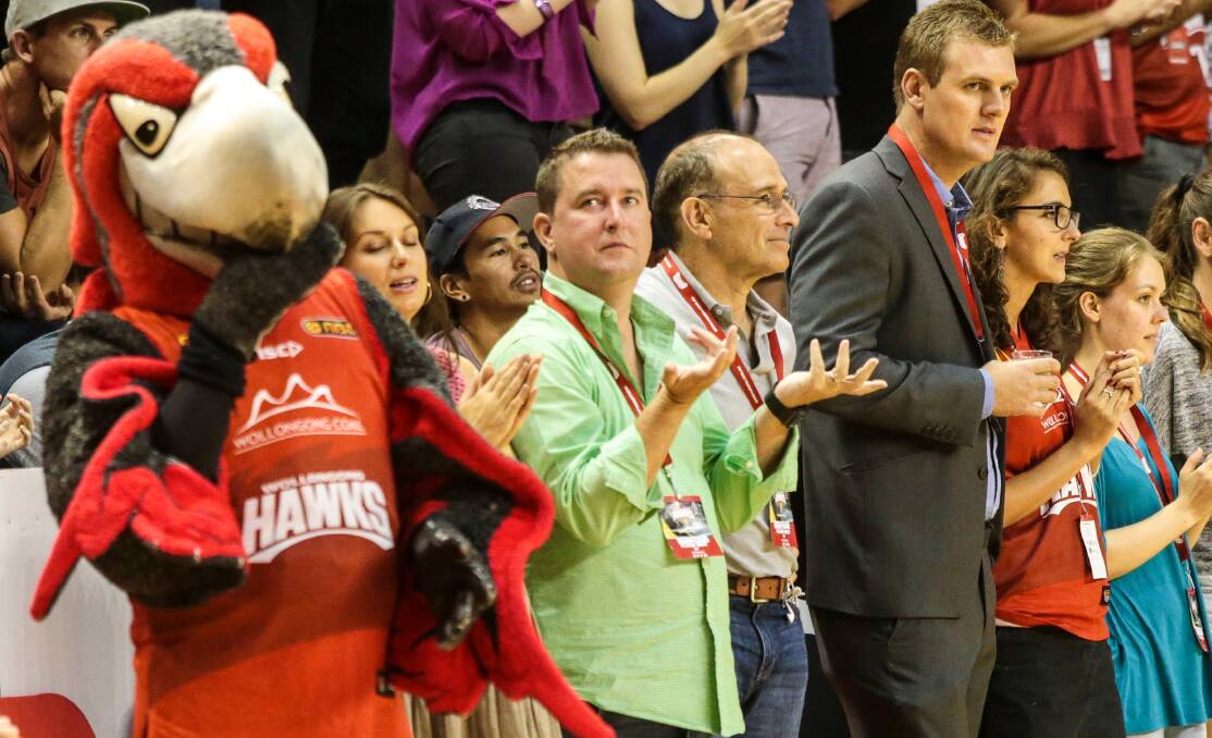 Hawks owner James Spenceley (green shirt) at a game in February. Picture: ADAM McLEAN