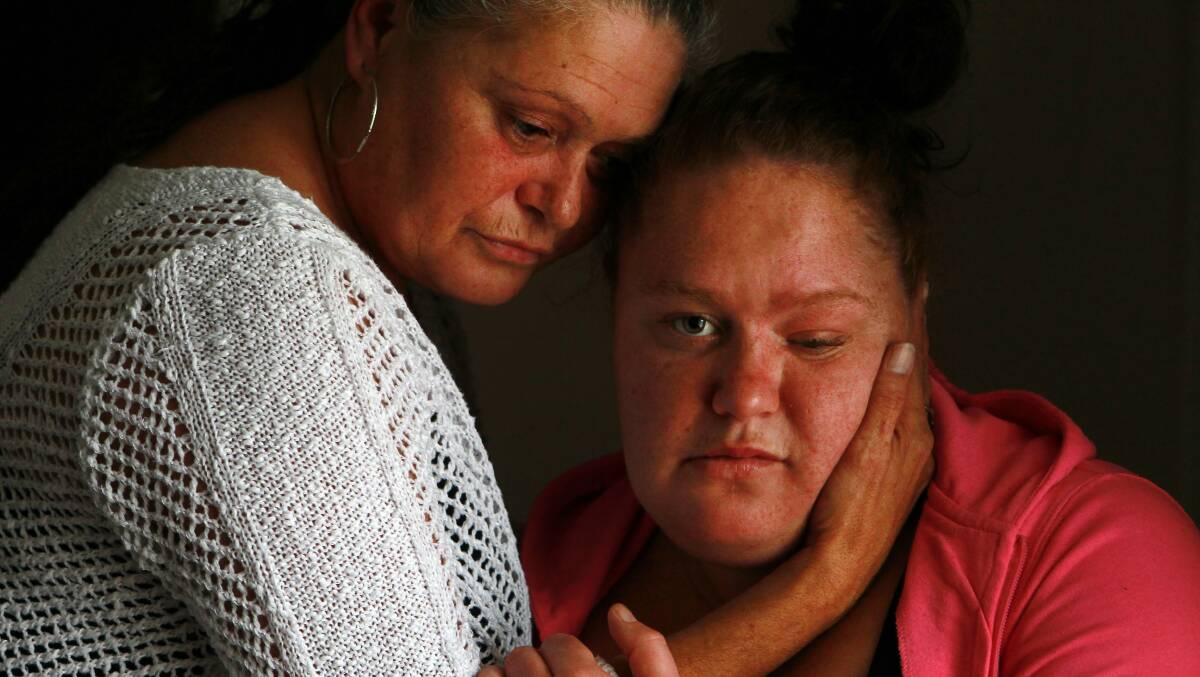 Renee Sullivan is comforted by her mother Karen. Picture: SYLVIA LIBER