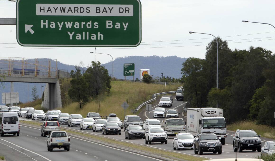 Traffic banked up on the Princes Highway near Albion Park last Thursday. Picture: ANDY ZAKELI