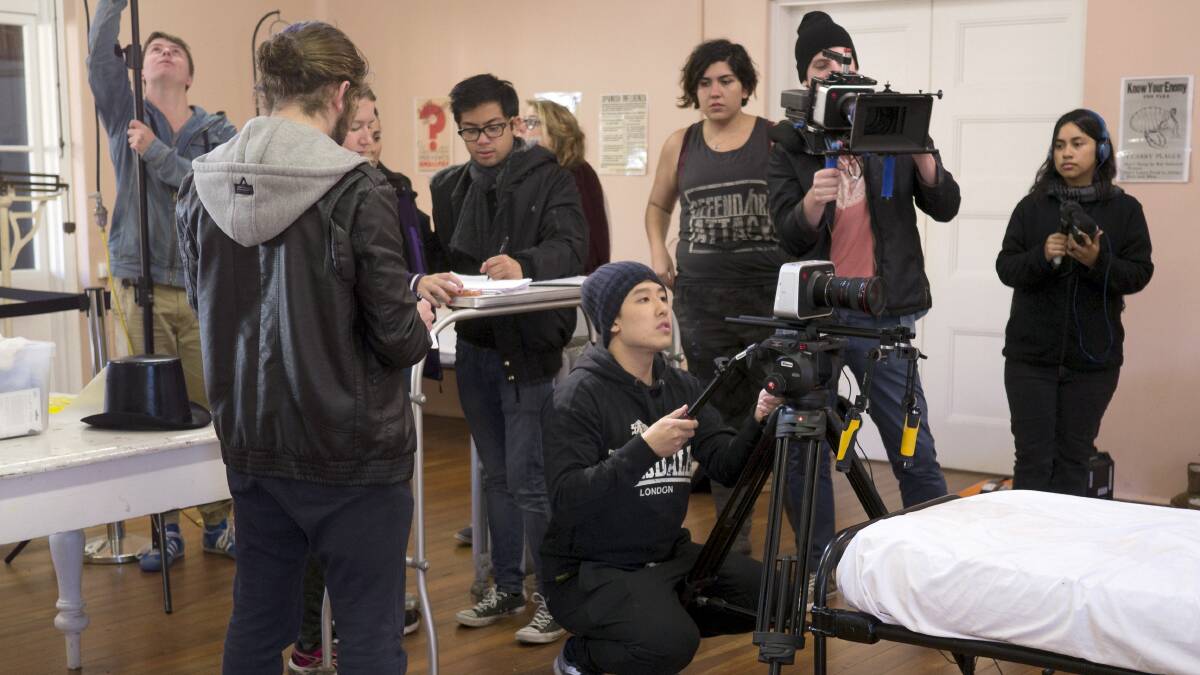 Co-director Arnold Perez (in black scarf) during filming. Picture: SUPPLIED