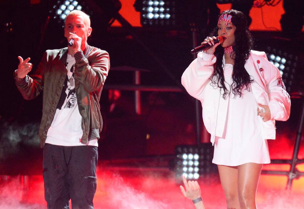 Eminem and Rihanna at the 2014 MTV Movie Awards. Picture: GETTY IMAGES