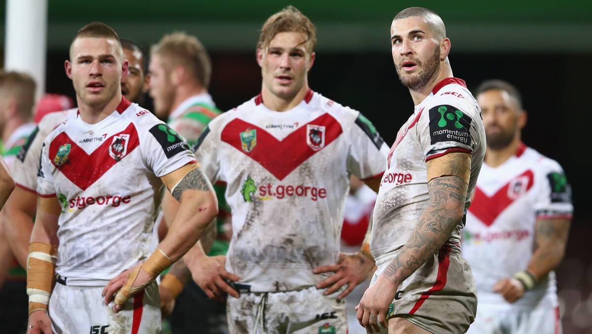 Euan Aitken, Jack De Belin and Joel Thompson of the Dragons after a Rabbitohs try last week. Picture: GETTY IMAGES