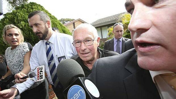 Arrested: Detectives lead Roger Rogerson from his Padstow Heights home. Photo: Nick Moir