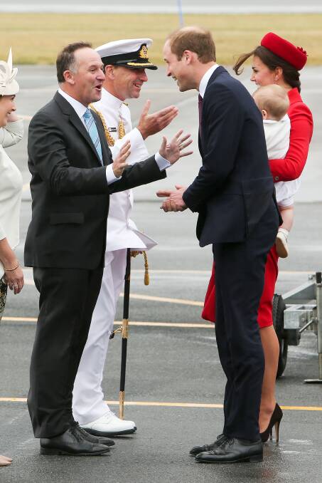 Prince William, Duke of Cambridge, speaks to New Zealand Prime Minister John Key. Picture: GETTY IMAGES
