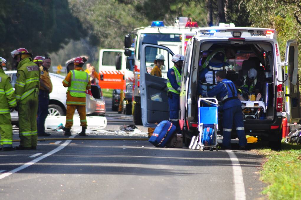 Emergency services at the accident scene on Bolong Road. Picture: SOUTH COAST REGISTER
