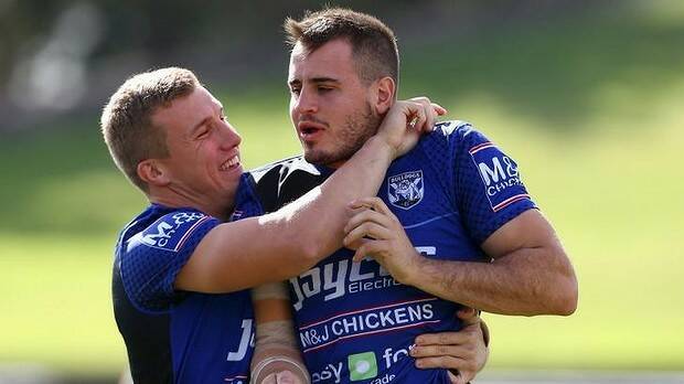 Blues brothers in arms: halves duo Trent Hodkinson and Josh Reynolds. Picture: Getty Images