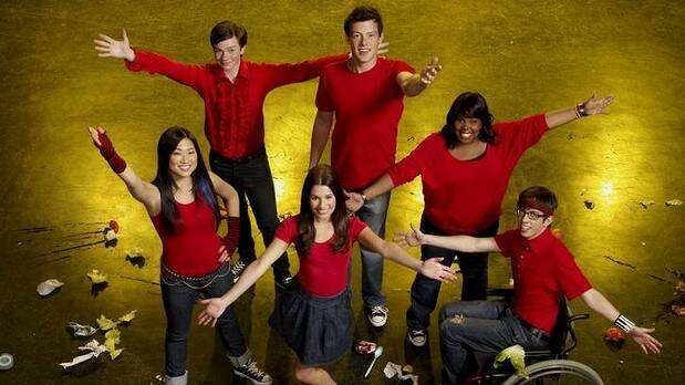 Hacked not sacked ... Chris Colfer, top left, with his Glee cast mates. Photo: Fox