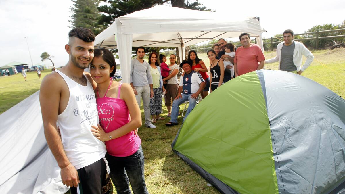 Laeth Jabar and Sama Abd of Fairfield have driven to Wollongong with their families for the day. Picture: ANDY ZAKELI