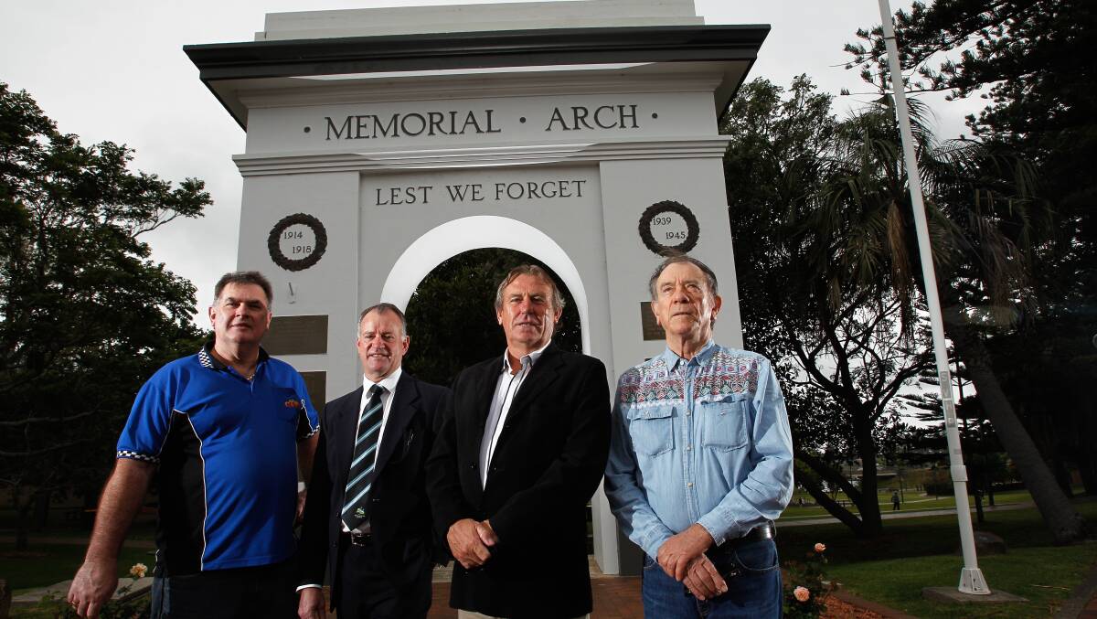 Kiama councillor Gavin McClure, Kiama Council’s director of engineering and works Bryan Whittaker, Kiama councillor Dennis Seage and Kiama-Jamberoo RSL sub-branch president Ian Pullar in front of Kiama’s Memorial Arch. Picture: CHRISTOPHER CHAN