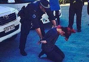 The photograph of Lily Allen being handcuffed. Photo: Twitter