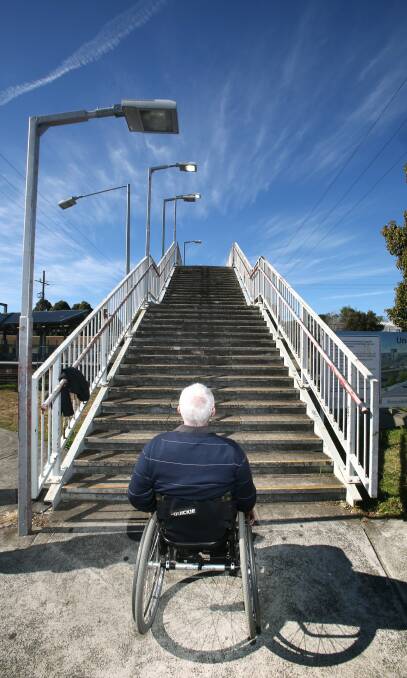 Alex Traill from Spinal Cord Injuries Australia at Unanderra station. Picture: KIRK GILMOUR
