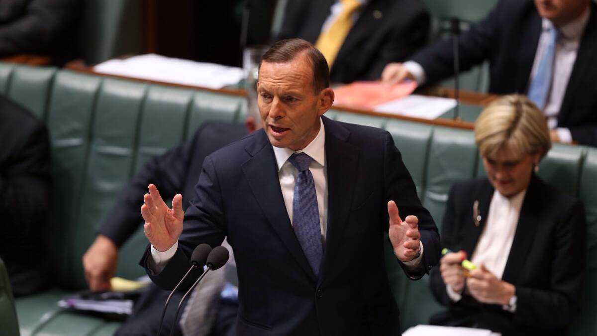 Abbott commits Australian forces to Iraq