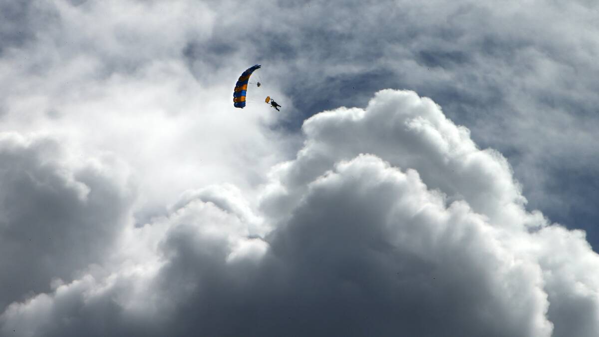 Skydivers near Wollongong Harbour. Picture: KIRK GILMOUR