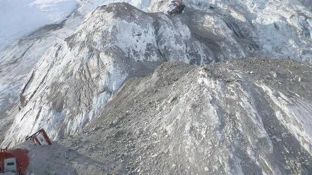 A New Zealand Department of Conservation alpine hut is engulfed by an avalanche that hit Mount Cook on New Zealand's South Island on Wednesday. Picture: TWITTER