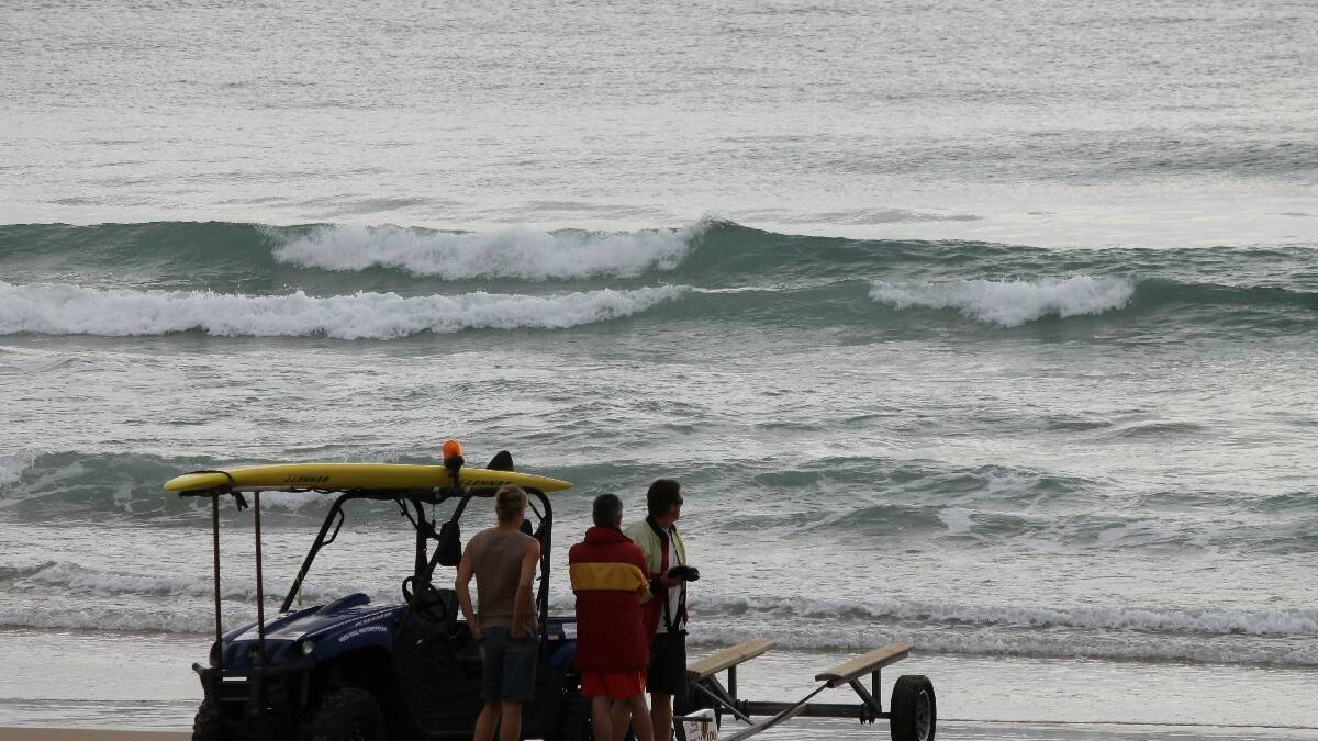 Searchers at the scene of a suspected shark attack at Tathra. PHOTO: BEN SMYTH, Bega District News 
