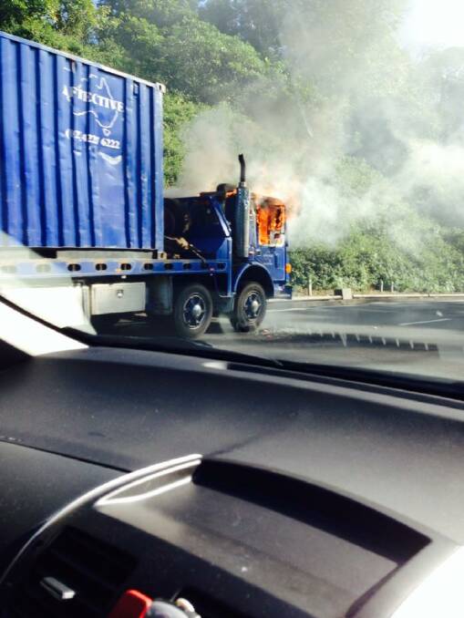 Truck on fire on Mount Ousley Road
