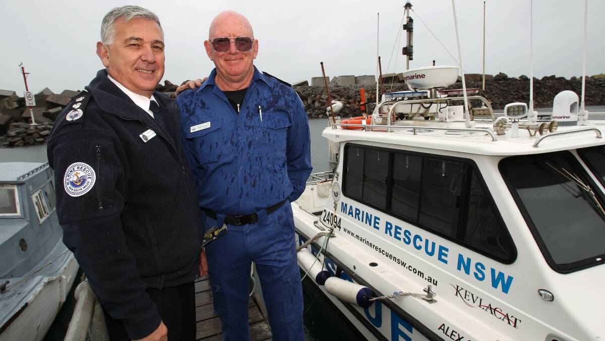 Marine Rescue NSW Commissioner Stacey Tannos (left) with Pride of the Illawarra volunteer of the year winner Graeme McCrudden. Picture: GREG TOTMAN