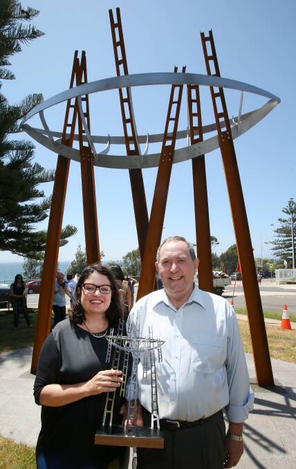 Artist Nerine Martini with WGE Group’s Tom Gallo at the unveiling of The Migration Project sculpture at George Dodd Reserve, North Wollongong. WGE supervised the artwork’s construction. Picture: KIRK GILMOUR
