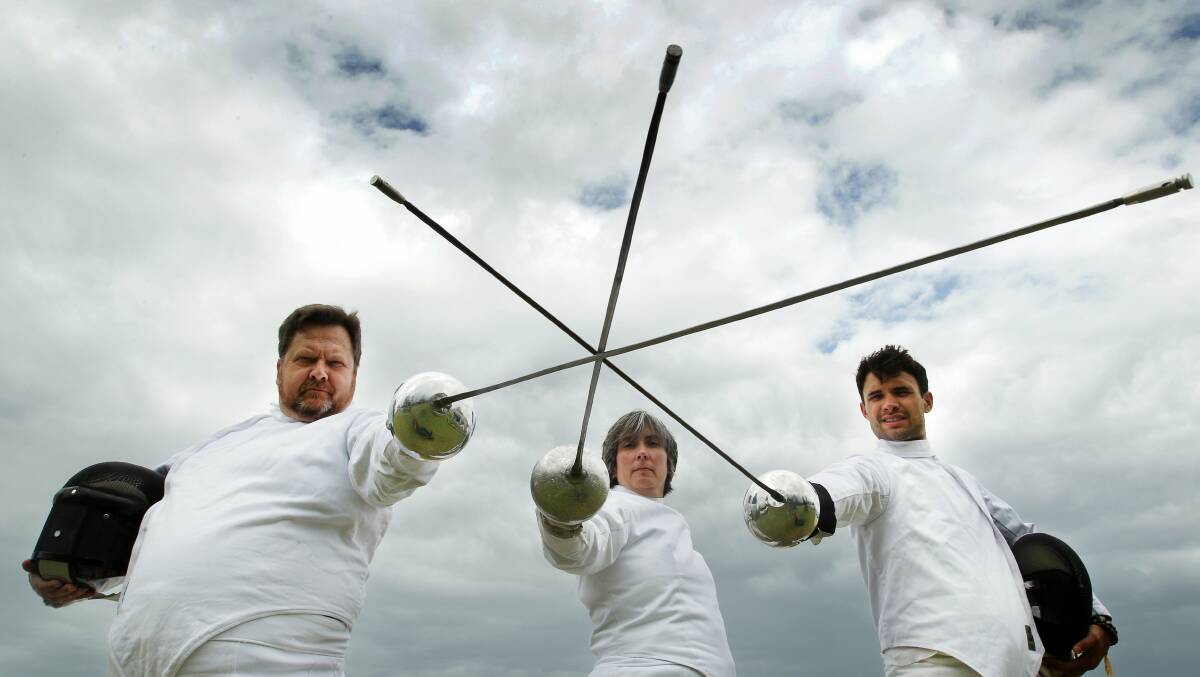 Bulli Swords members Houston Duleavy, Laura Goodin and Steve Wells will hold a fencing demonstration at Crown Street Mall on Saturday. Picture: SYLVIA LIBER