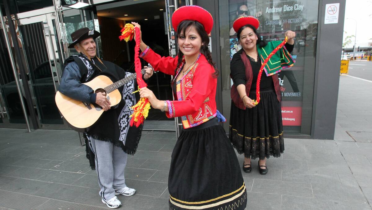 Peruvian performers Louis Trucido (left), Patricia Collado and Bertha Quiros get ready for the Illawarra Spanish Latin American Festival next week. Picture: GREG TOTMAN