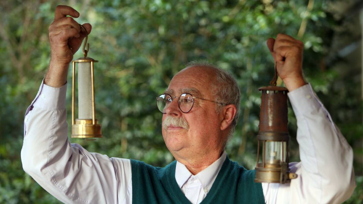 Andrew Conacher holds up miner’s safety lamps. On August 7 he will talk about his ancestor Sir Humphry Davy, who invented the lamp.  Picture: KIRK GILMOUR