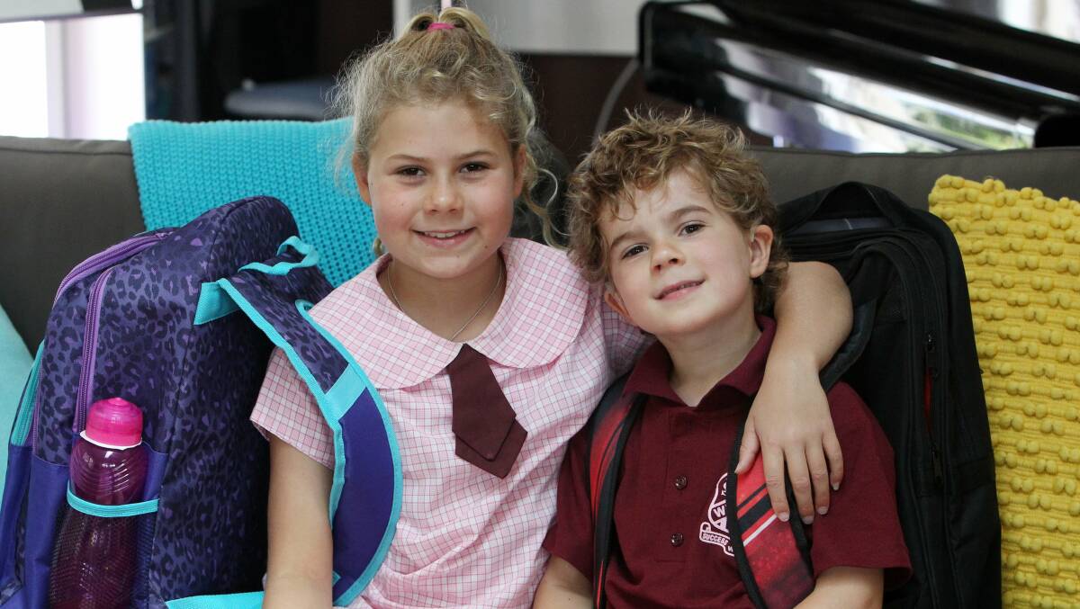 Five-year-old Felix Williams, pictured with eight-year-old sister Amelie, was born with a profound hearing loss. After five years of therapy at The Shepherd Centre he will start kindergarten next week at Windang Public School. Picture: GREG TOTMAN