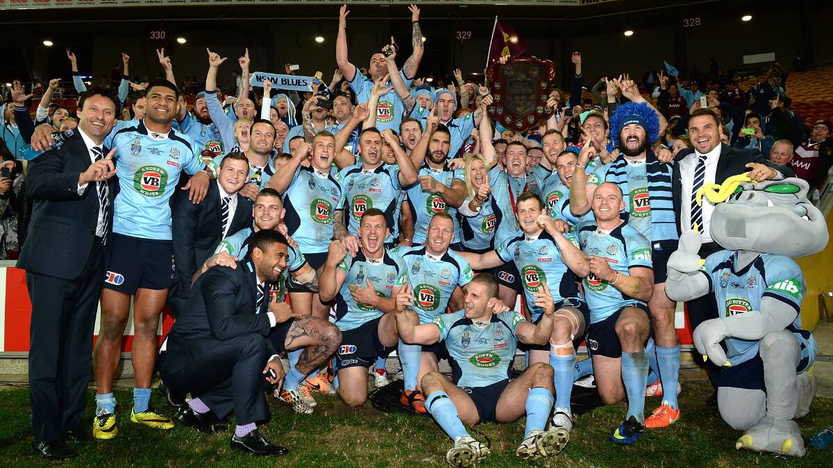 Blues players celebrate their Origin series win after game three. Picture: GETTY IMAGES