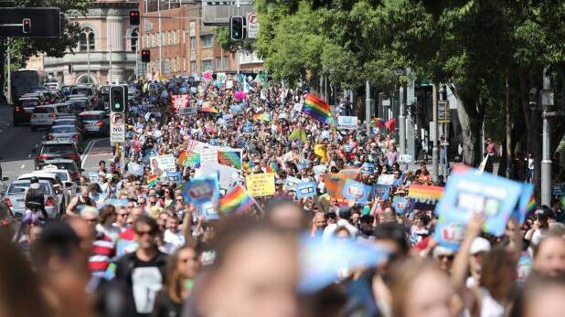 Thousands of people march in support of Marriage equality near Victoria Park in Sydney on Saturday.  Photo: AAP
