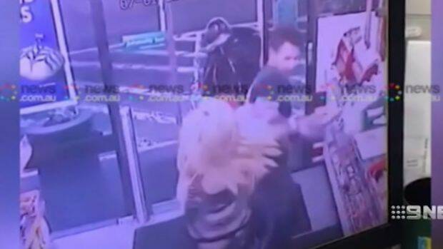 A screenshot from the CCTV inside the 7-Eleven at Enmore.  Photo: Nine News
