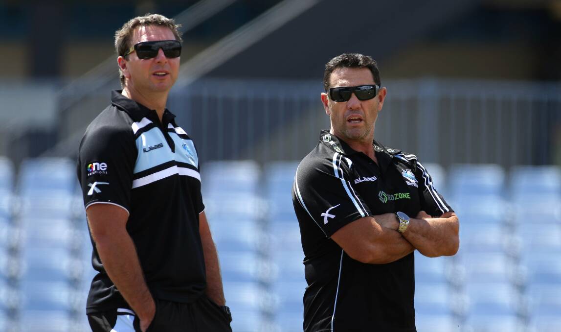 New colours: Sharks assistant coach Steve Price with Shane Flanagan. Picture: JOHN VEAGE