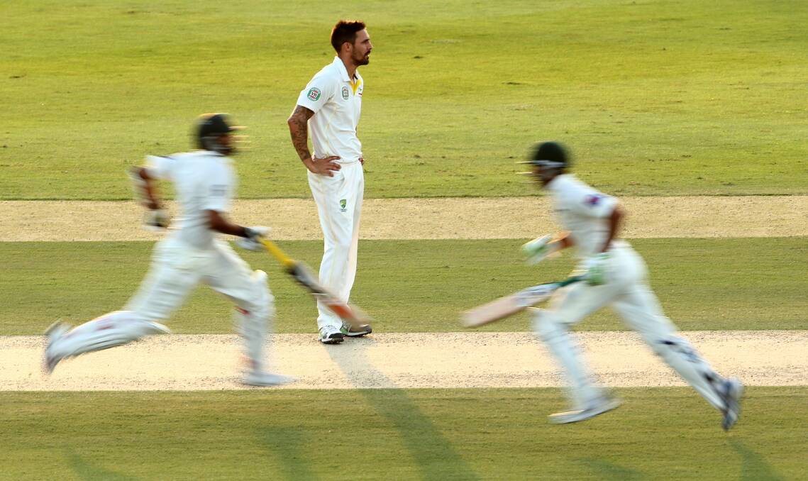 Runs: A frustrated Mitchell Johnson. Picture: GETTY IMAGES