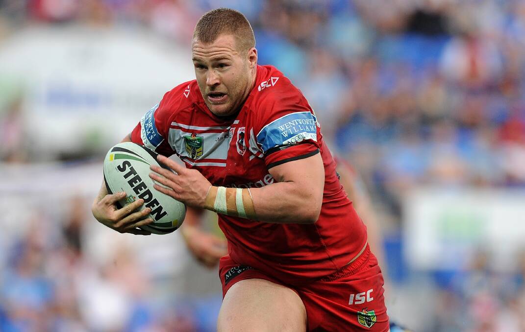 Leaving home: Penrith-bound Dragons prop Trent Merrin. 