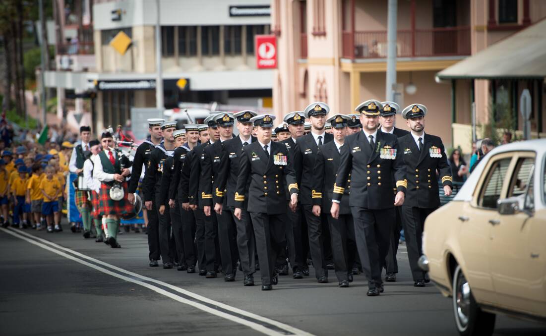 Kiama residents gather along Terralong Street to honour those who have served in conflict. Picture: ALBEY BOND