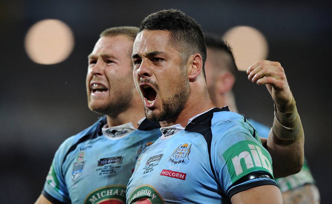 NSW fullback Jarryd Hayne celebrates with Trent Merrin after the great win. Picture: GETTY IMAGES