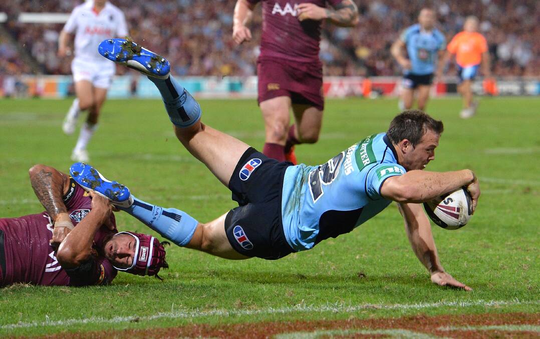 Blues winger Brett Morris scoring a try moments before injuring his shoulder. Picture: GETTY IMAGES
