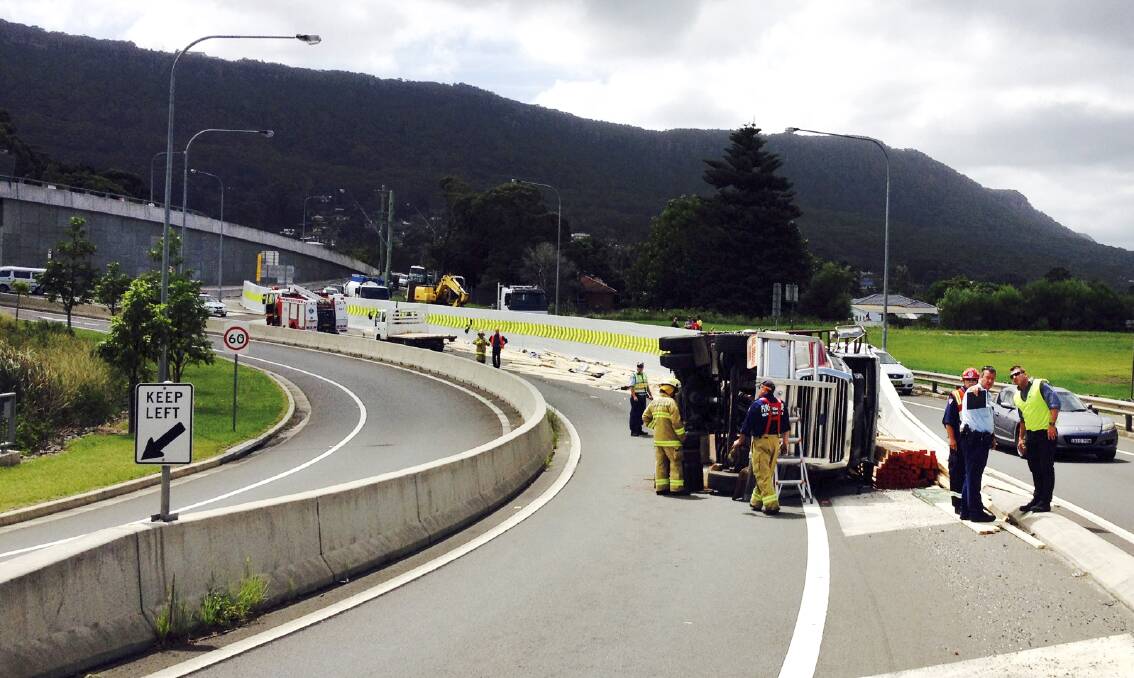 Bulli Pass is closed following a truck rollover on this afternoon. Picture: ROBERT PEET