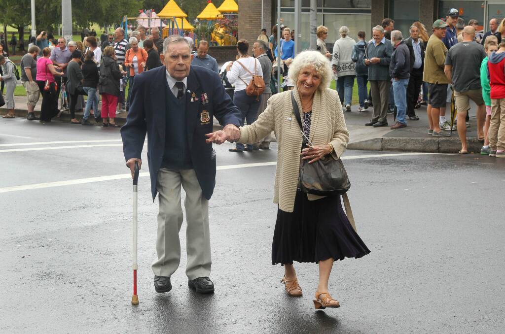 Bill and Margaret Atkinson married for 62 years finish off the march with smiles. Picture: KIRK GILMOUR