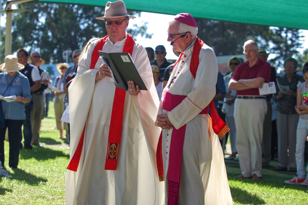 Bishop Peter Ingham leads the service of the Stations of the Cross at Saint Francis Xaviers. Picture: ADAM McLEAN