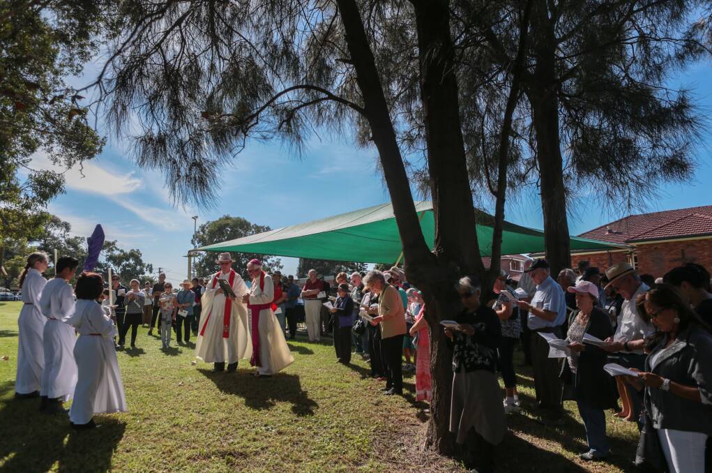 Bishop Peter Ingham leads the service of the Stations of the Cross at Saint Francis Xaviers. Picture: ADAM McLEAN
