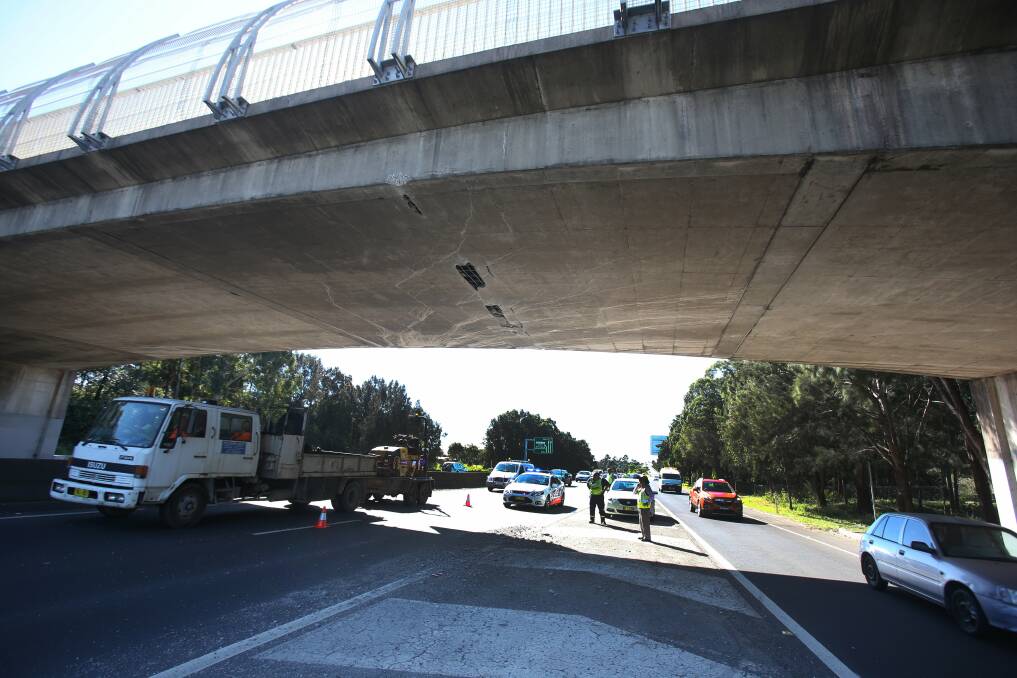 The scene of a truck accident south bound on Memorial Drive at the University Avenue Bridge. The truck struck the bridge causing enough damage to close one lane. Picture: ROBERT PEET