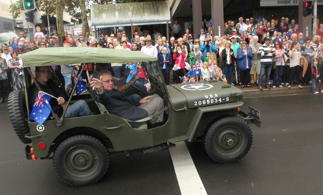  A big crowd of supporters roll up for the Anzac Day Wollongong City march on Church and Burelli streets. Picture: KIRK GILMOUR