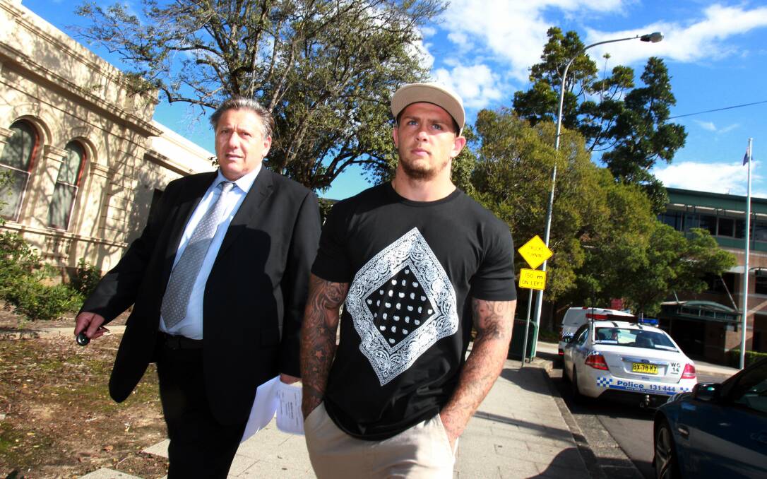 St George Illawarra reserve grade player Craig Garvey leaving Wollongong Police Station with his solicitor in March this year.