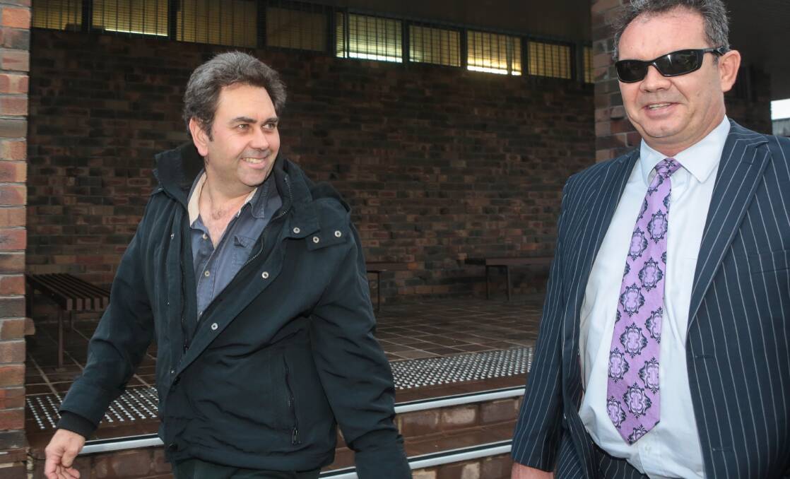 Bernhard Stevermuer leaving Port Kembla court after getting bail. He is pictured with his lawyer Mark Savic. Picture: ADAM McLEAN