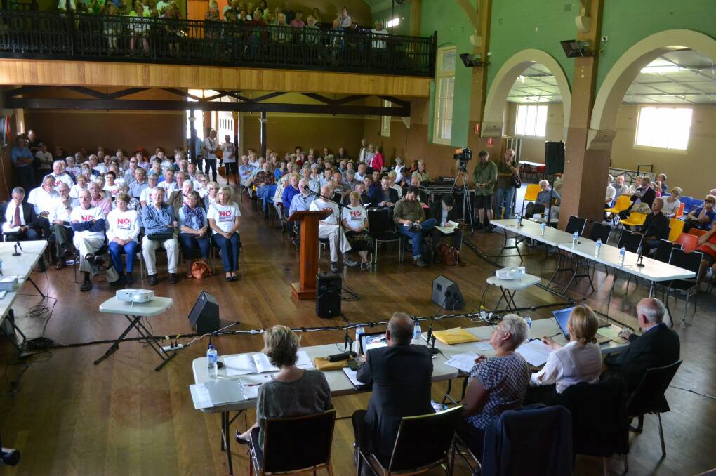 Panel members and attendees at a Joint Regional Planning Panel public meeting in Berry to discuss a proposal for a $13.6million tourist and function centre at Bellawongarah.  Picture: ROBERT CRAWFORD