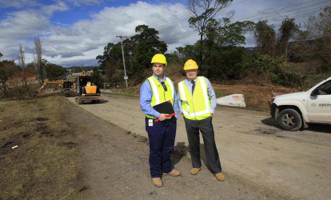 WCC Senior Projects Manager Christopher Brown with Lord Mayor Gordon Bradbery inspecting works at West Dapto in September 2014. Picture: ANDY ZAKELI