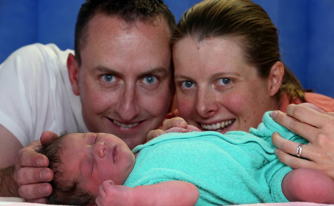 Michael Baker and Katherine Baker with baby Chloe Baker, who was born at Wollongong Hospital on Father’s Day. Picture: ROBERT PEET
