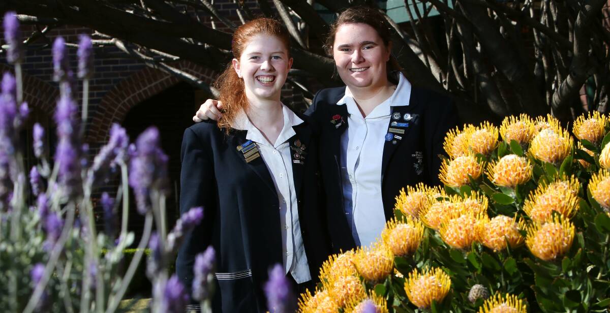 Meg Cummins and Vivian Connor are two year 12 St Marys students chosen as winners of the 2015 John Lincoln Youth Community Service Awards. Picture: KIRK GILMOUR